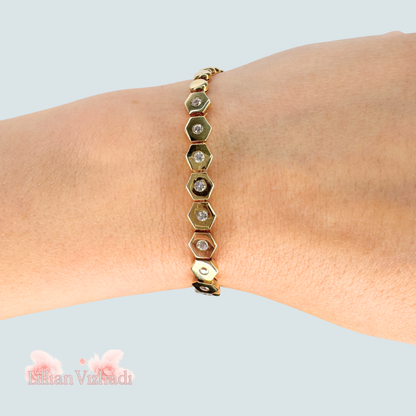 Brățară aurie din cercuri si hexagoane cu zirconii